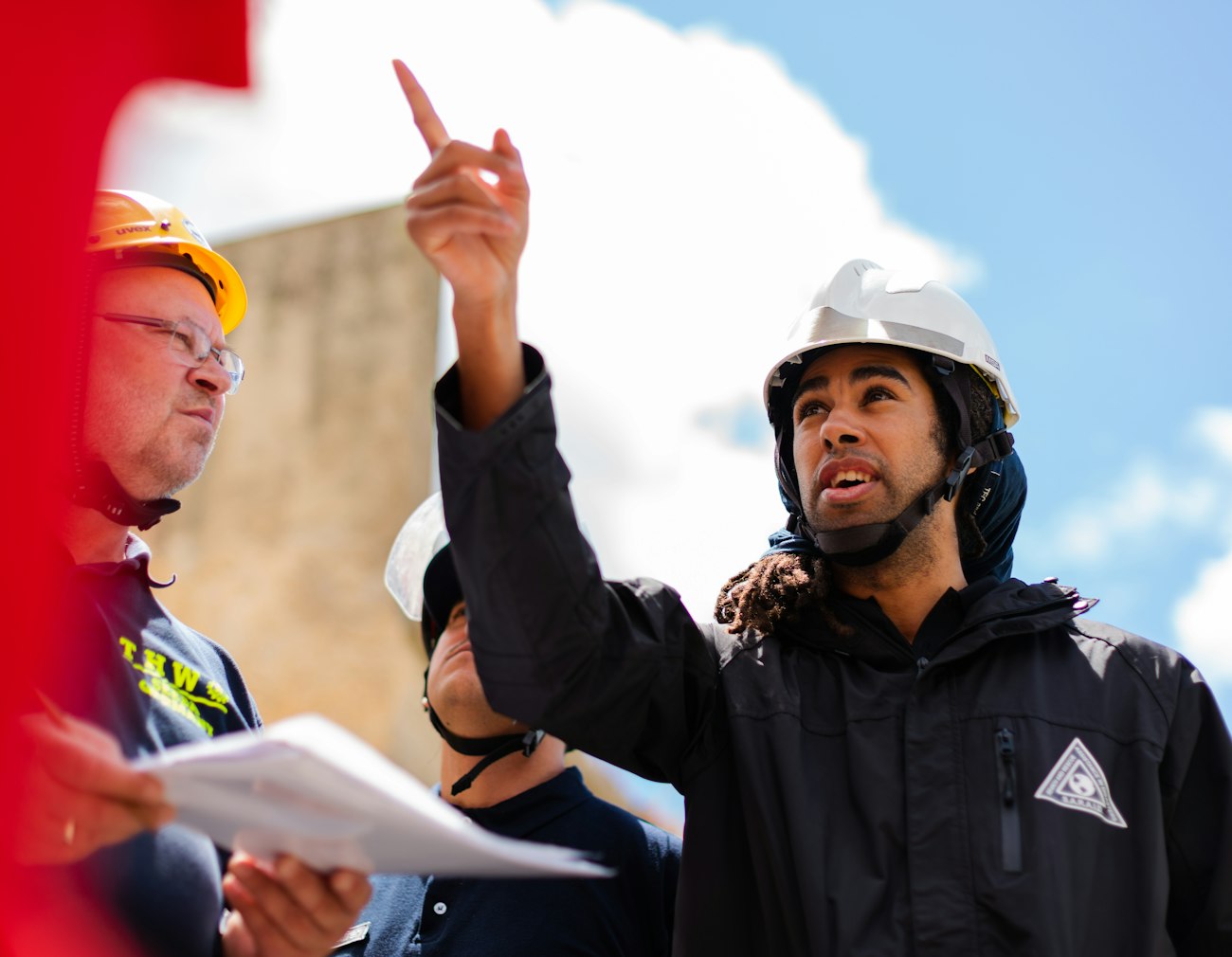 Engineers reviewing plant operations on site
